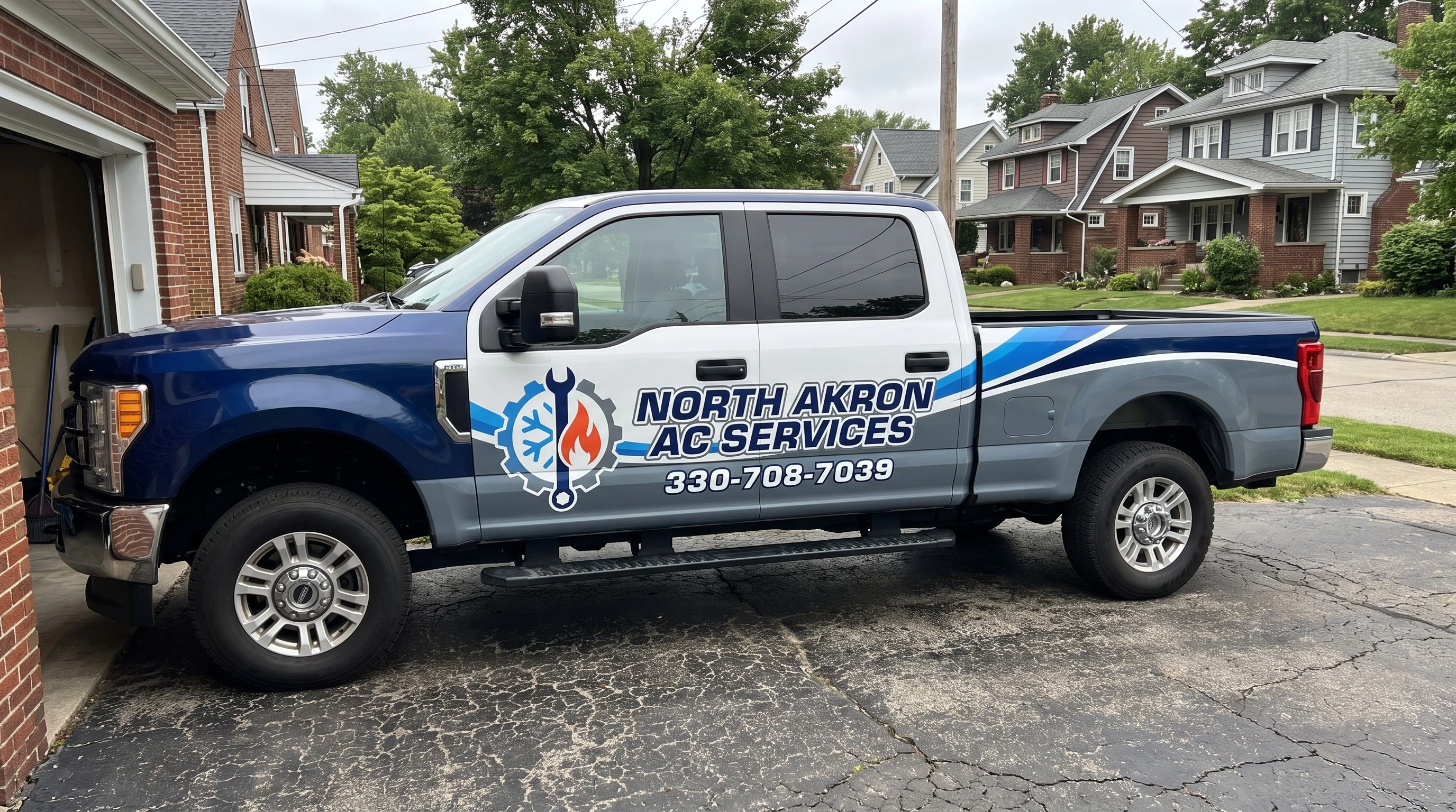 North Akron AC Services technician servicing a residential HVAC condenser unit in Akron, OH